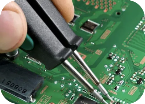 A soldering iron working on a phone motherboard
